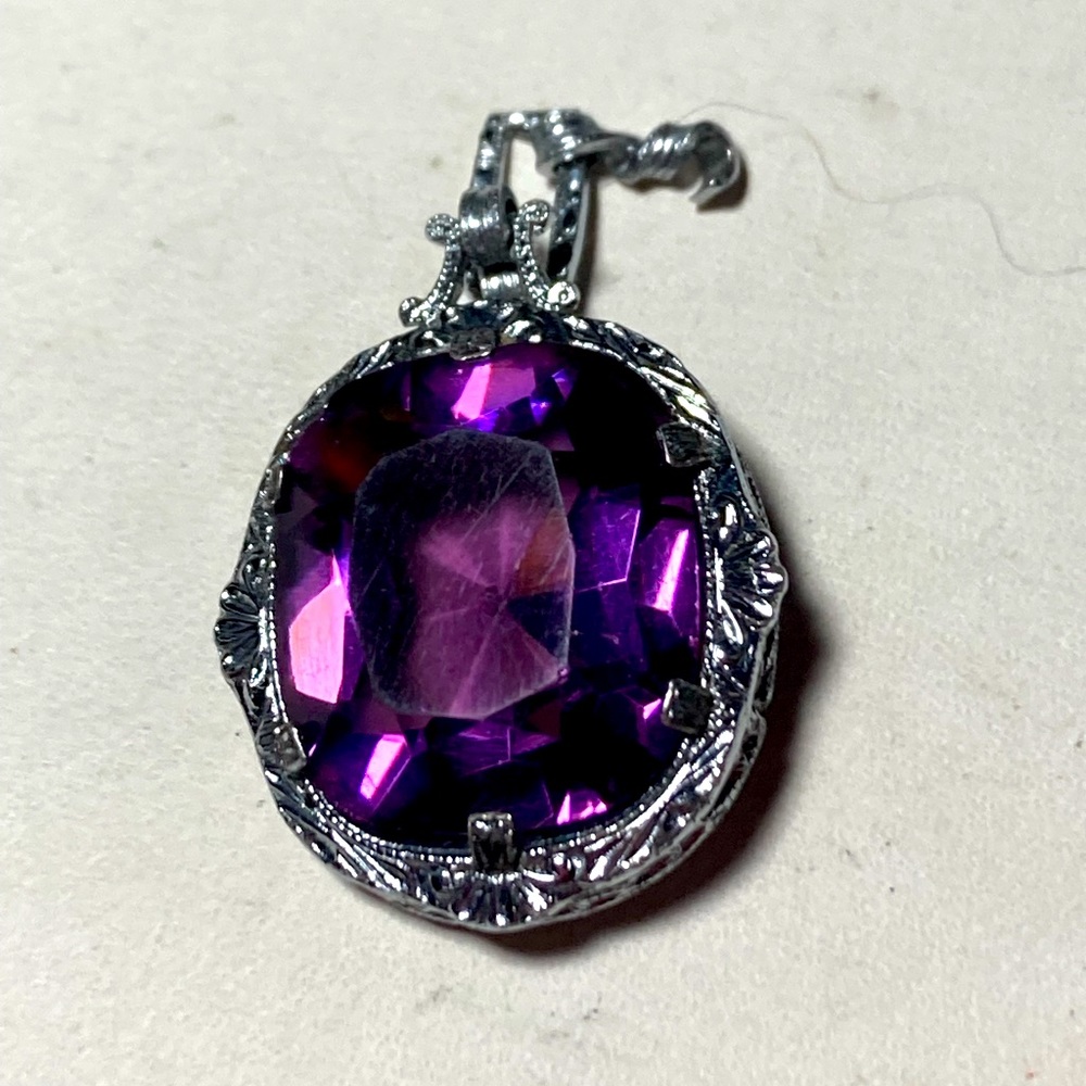 Silver pendant with purple crystal.  #1039
